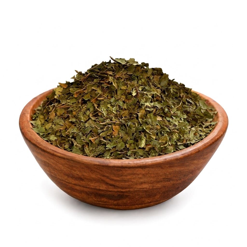 Wooden bowl of Green Borneo crushed kratom leaf